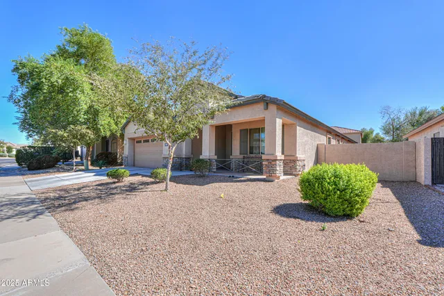 a house with a tree in front of it