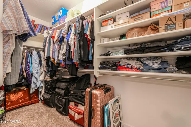 a view of a chairs and table in the patio