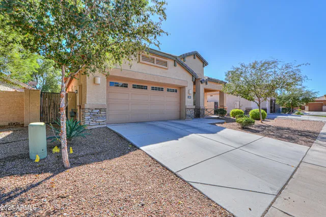 a house with trees in front of it