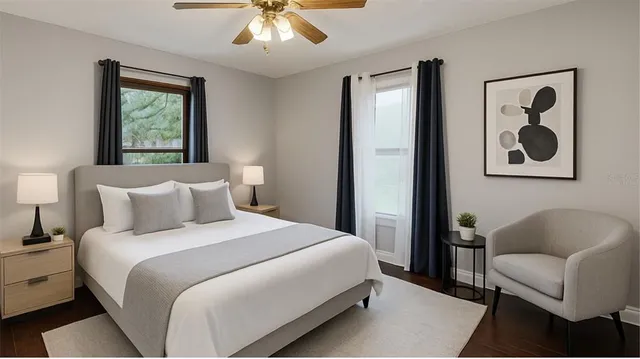 a bedroom with a bed and a couch