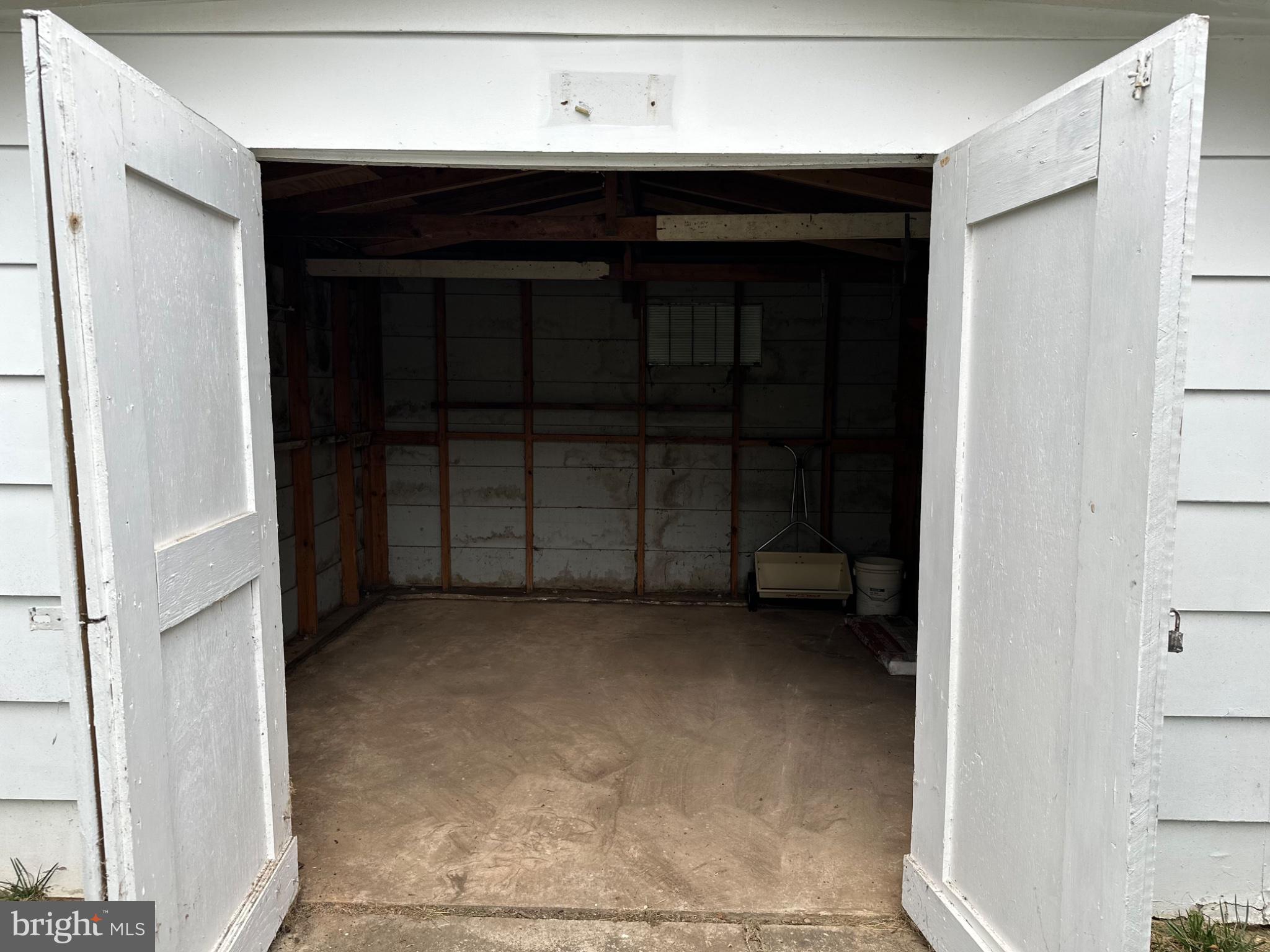 14616 Sturtevant Road Silver Spring, MD 20905 - Photo 43 of 44 Spacious garage with open doors.