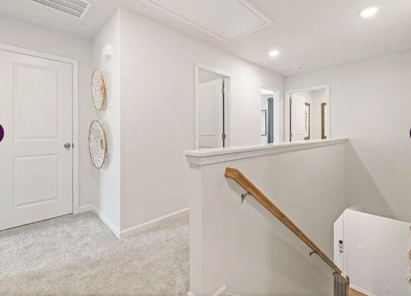 a view of room with window and bathroom