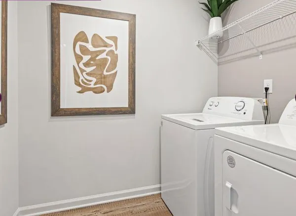 a utility room with dryer and washer