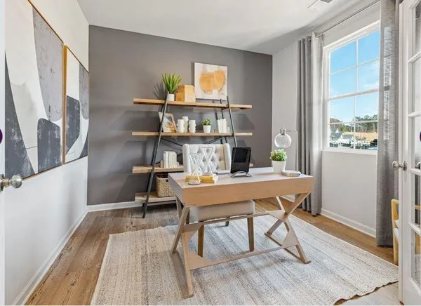 a room with a table and chairs