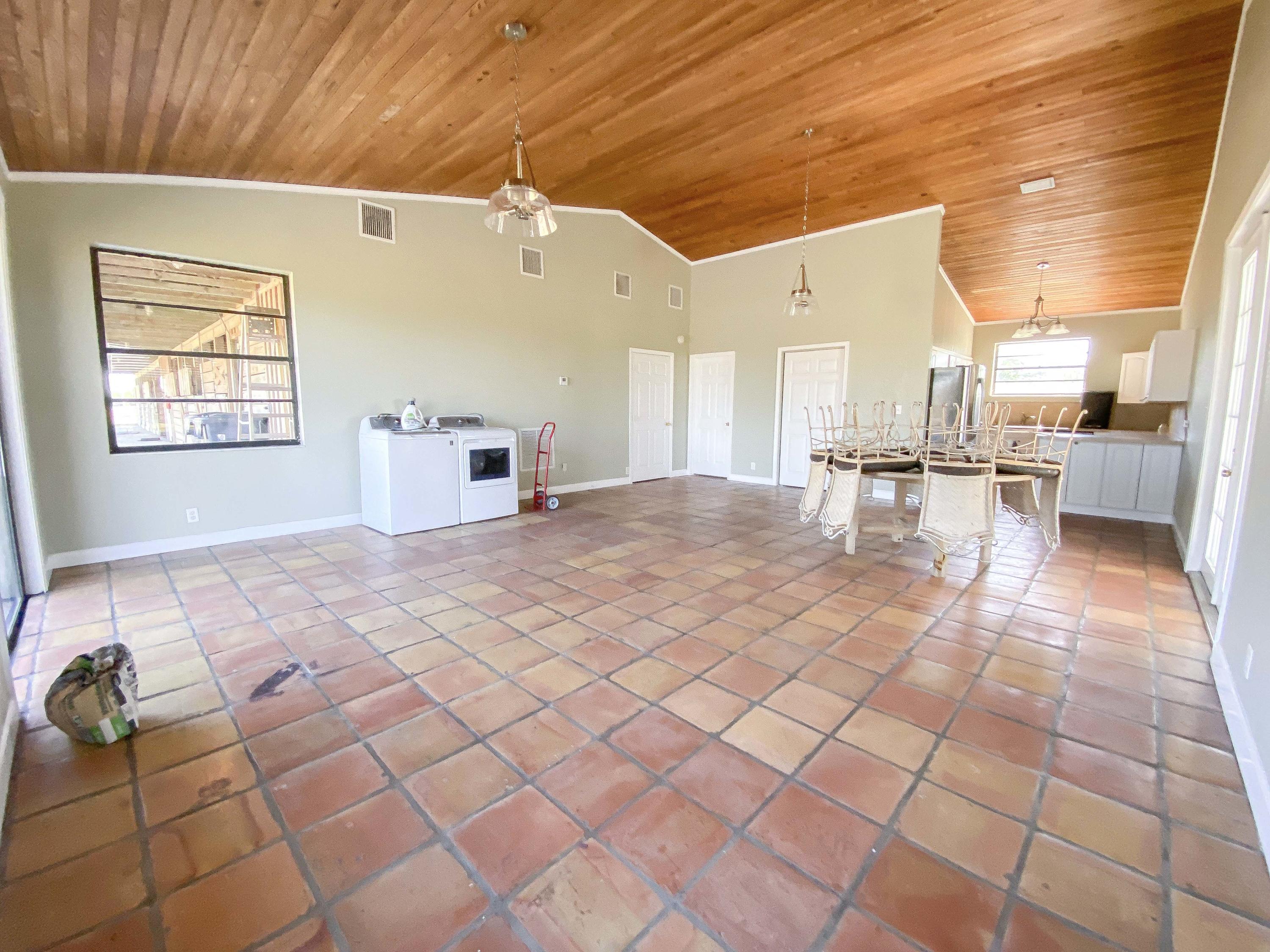 3715 Flying Cow Ranch Road Wellington, FL 33470 - Photo 16 of 33 a very nice looking room with a large window