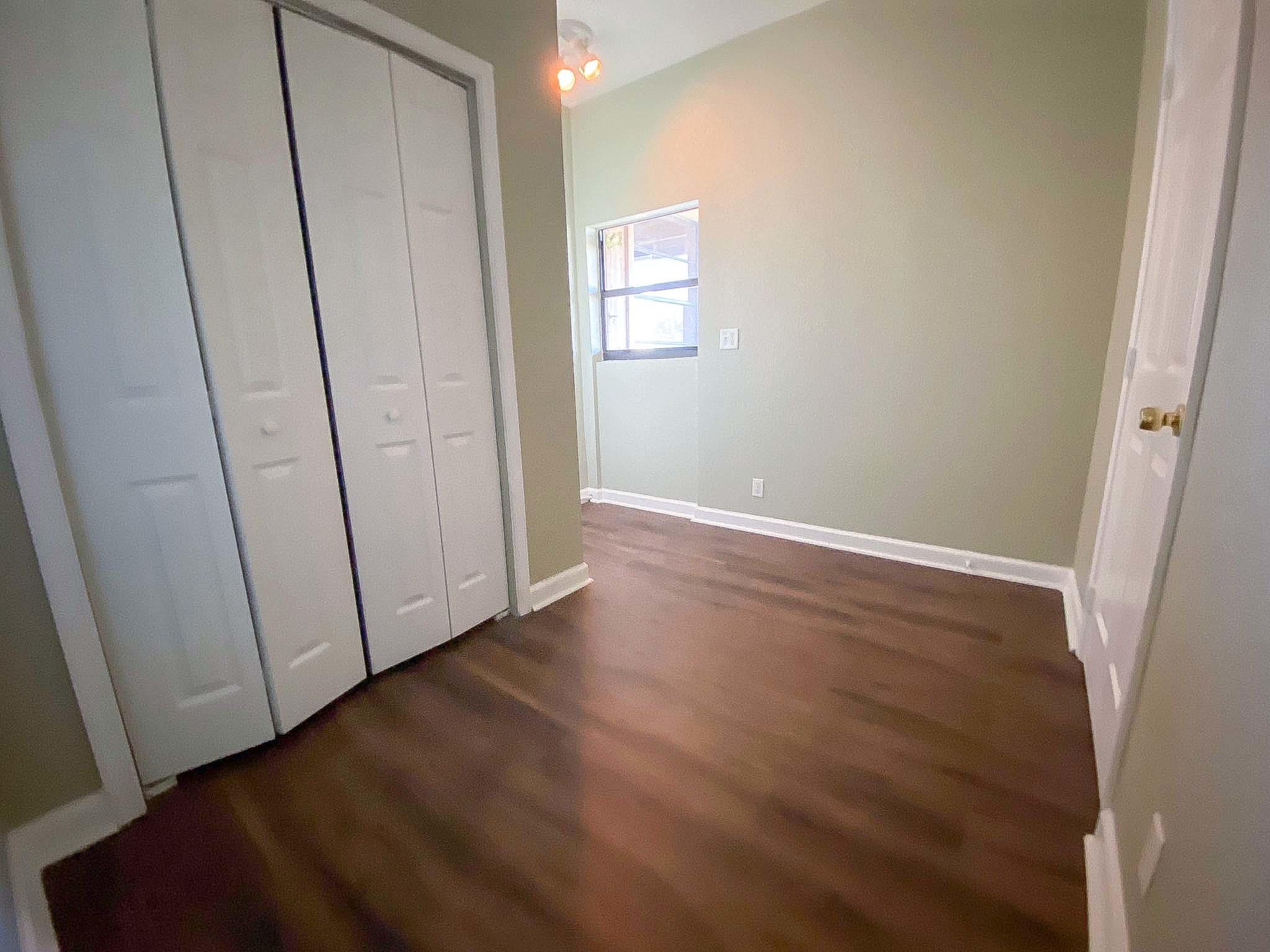 3715 Flying Cow Ranch Road Wellington, FL 33470 - Photo 28 of 33 a view of hallway with window and stairs
