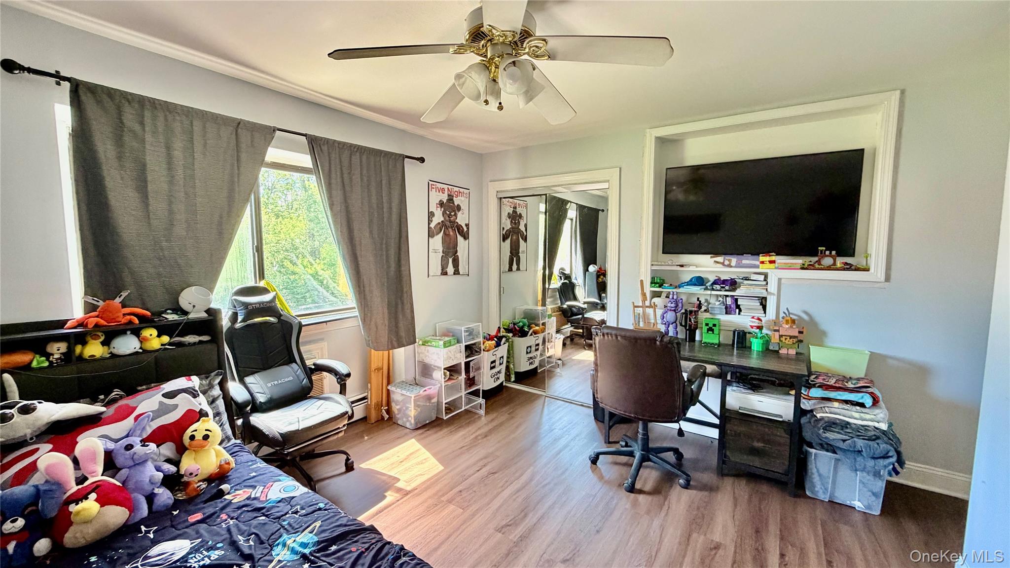 25 Pierces Road, Unit 28 Newburgh, NY 12550 - Photo 11 of 21 a living room with furniture and a flat screen tv