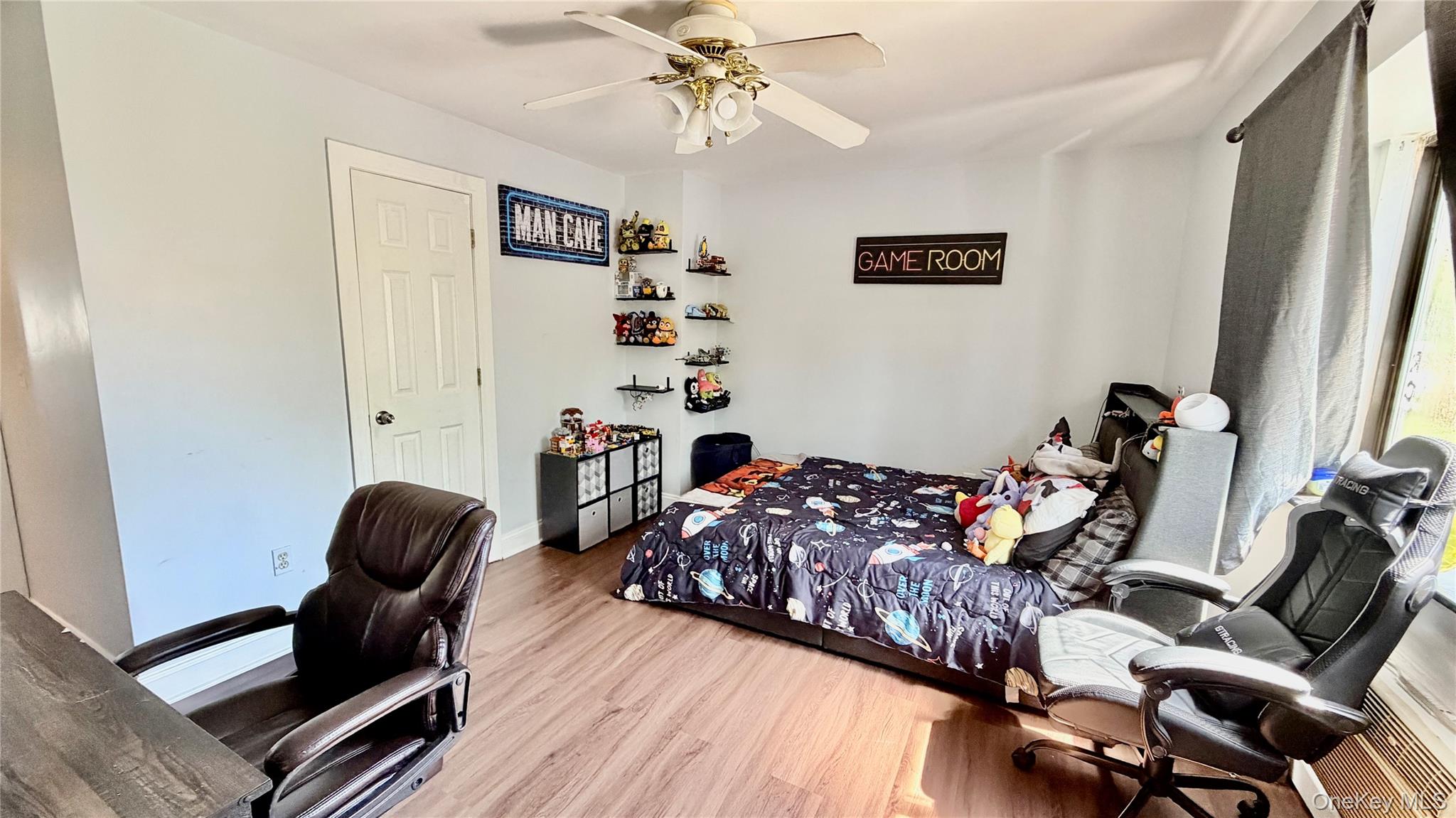 25 Pierces Road, Unit 28 Newburgh, NY 12550 - Photo 12 of 21 a bedroom with furniture and a bed
