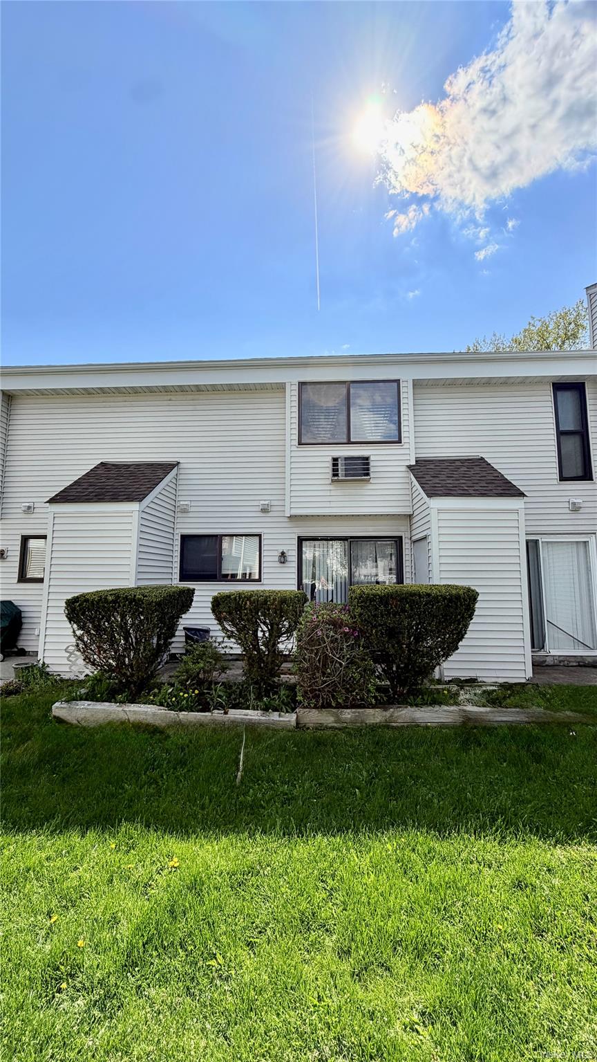 25 Pierces Road, Unit 28 Newburgh, NY 12550 - Photo 20 of 21 a front view of a house with a yard