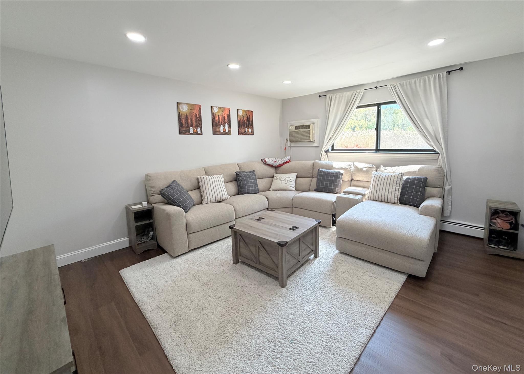 25 Pierces Road, Unit 28 Newburgh, NY 12550 - Photo 2 of 21 a living room with furniture and a large window