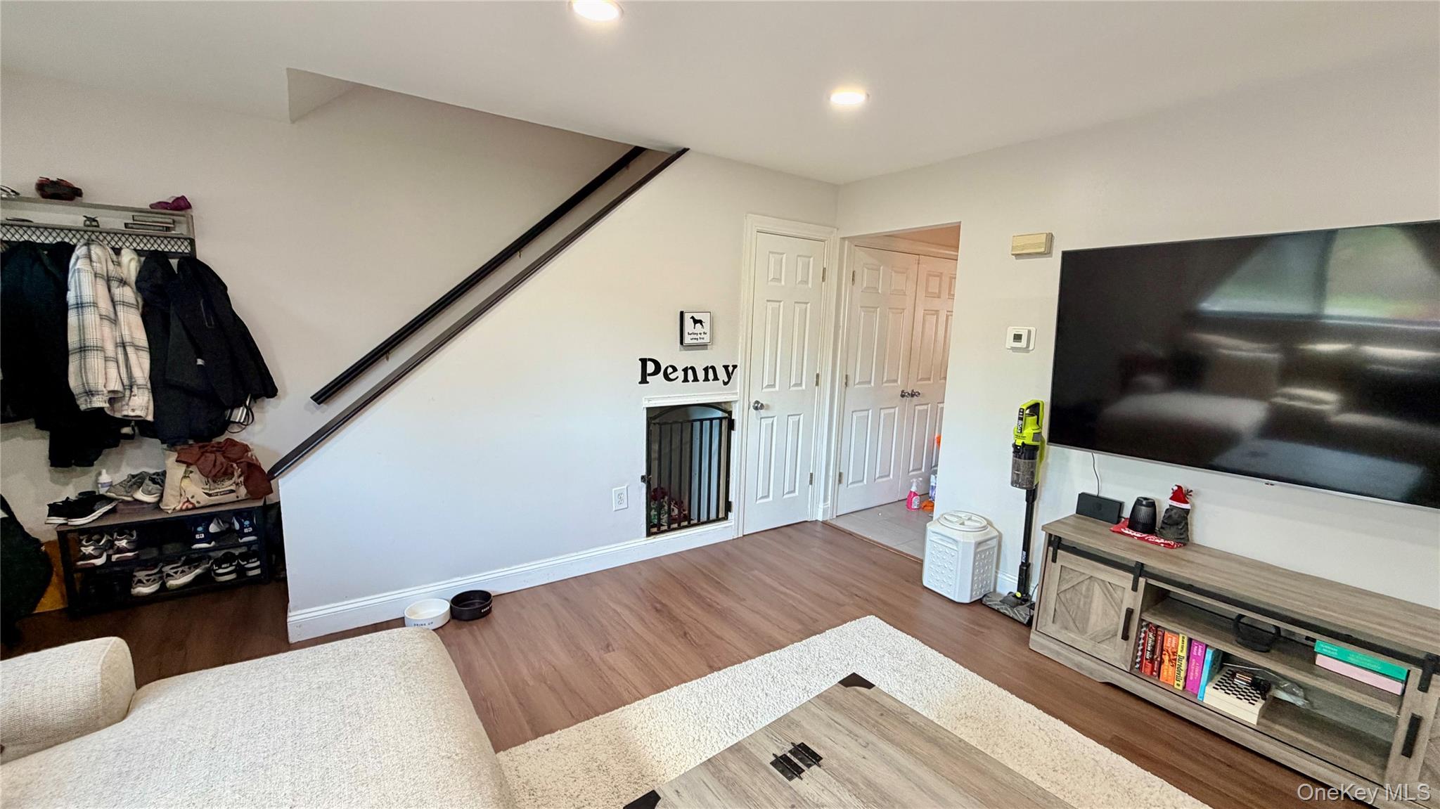 25 Pierces Road, Unit 28 Newburgh, NY 12550 - Photo 3 of 21 a living room with furniture and a flat screen tv