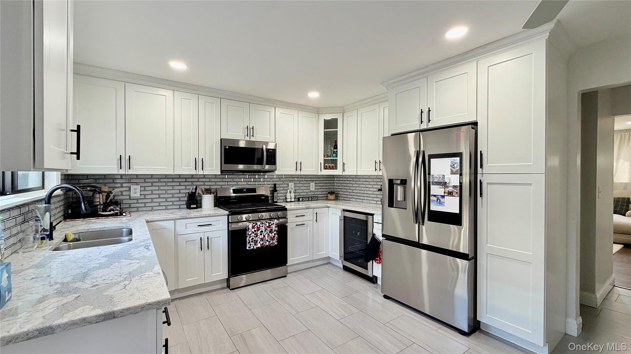 25 Pierces Road, Unit 28 Newburgh, NY 12550 - Photo 4 of 21 a kitchen with stainless steel appliances granite countertop a refrigerator stove microwave and sink