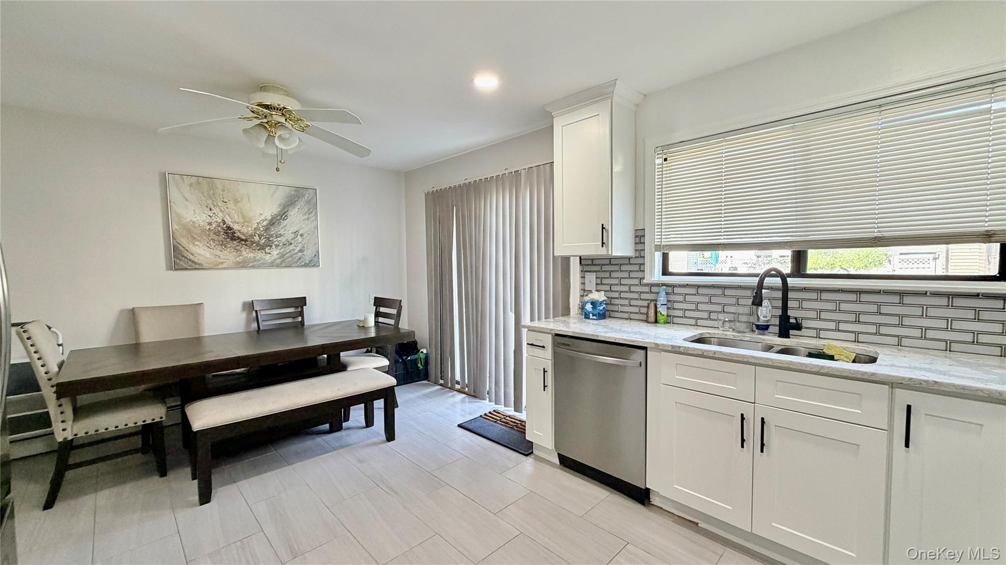 25 Pierces Road, Unit 28 Newburgh, NY 12550 - Photo 5 of 21 a spacious kitchen with a sink and a window