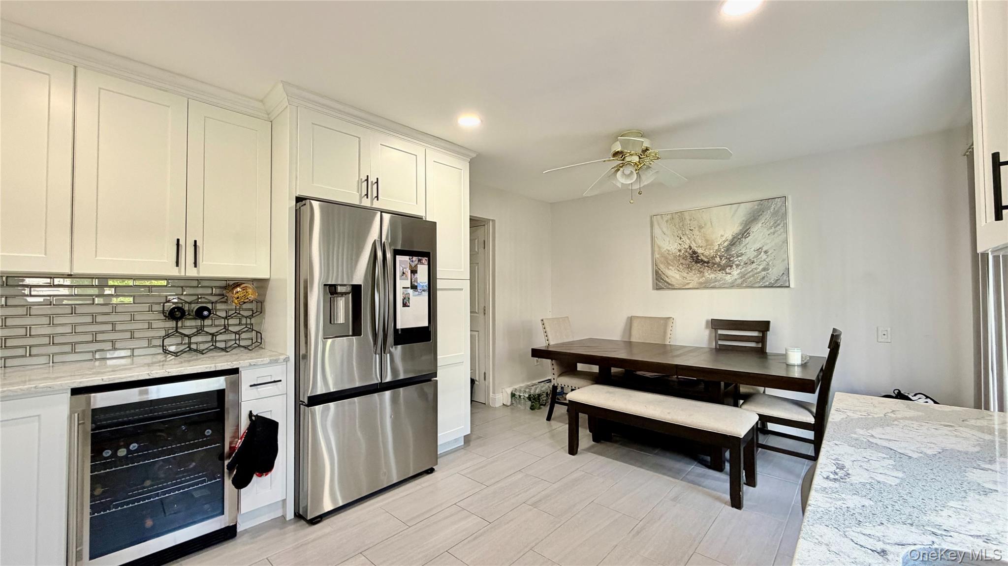25 Pierces Road, Unit 28 Newburgh, NY 12550 - Photo 6 of 21 a kitchen with a refrigerator and a stove top oven