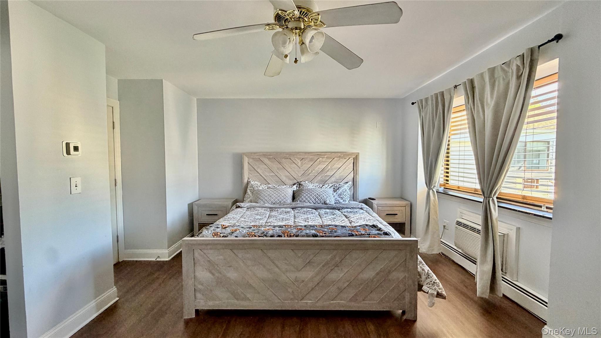 25 Pierces Road, Unit 28 Newburgh, NY 12550 - Photo 8 of 21 a bed sitting in a bedroom next to a window