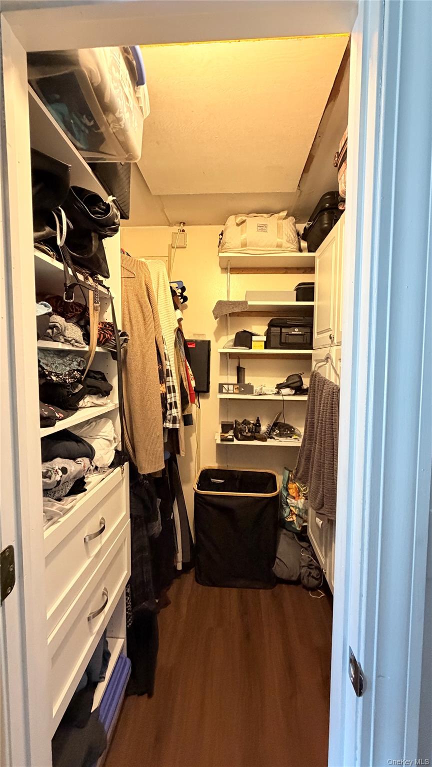 25 Pierces Road, Unit 28 Newburgh, NY 12550 - Photo 10 of 21 a view of walk in closet with clothes and shoes