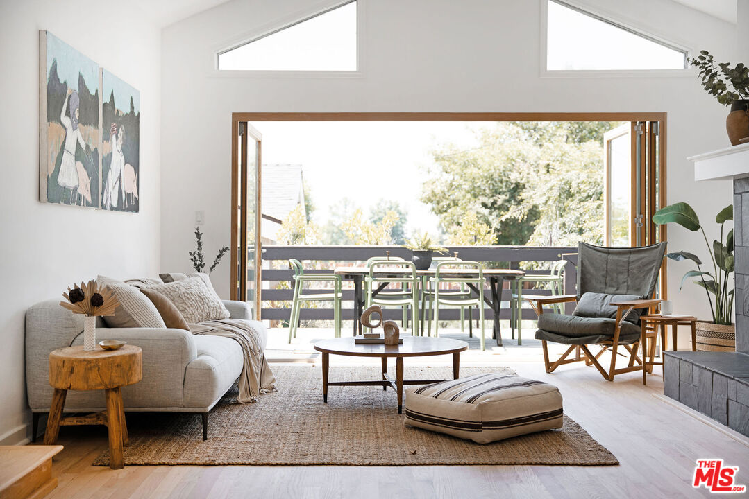 230 Marathon Road Altadena, CA 91001 - Photo 14 of 46 a living room with furniture and a large window