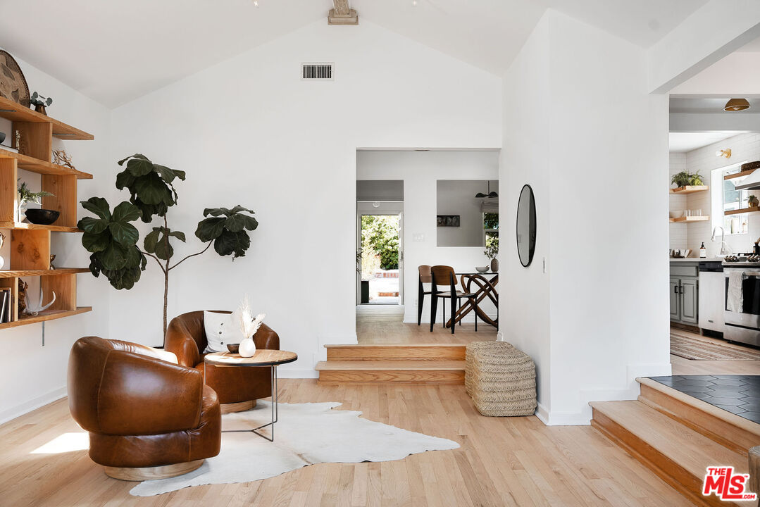 230 Marathon Road Altadena, CA 91001 - Photo 15 of 46 a living room with furniture and a wooden floor