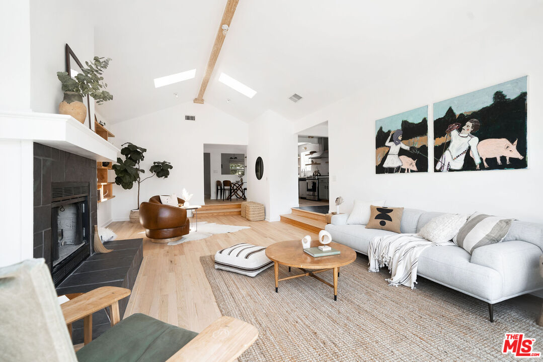 230 Marathon Road Altadena, CA 91001 - Photo 18 of 46 a living room with furniture fireplace and wooden floor