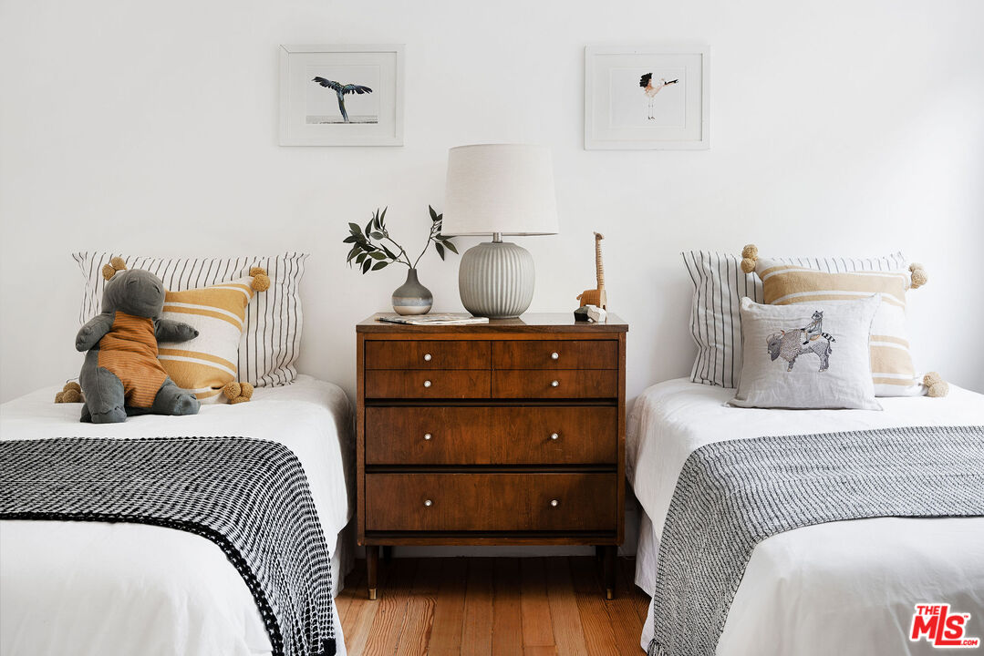 230 Marathon Road Altadena, CA 91001 - Photo 21 of 46 a bedroom with a bed and a night stand