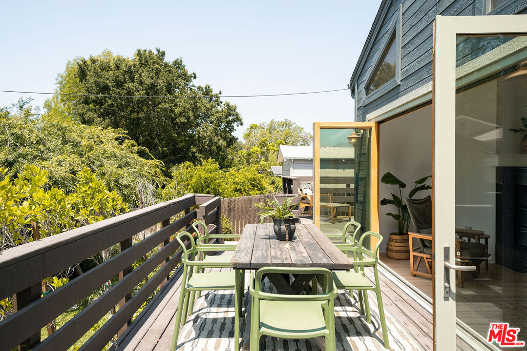 230 Marathon Road Altadena, CA 91001 - Photo 27 of 46 a balcony view with a large window and sitting space