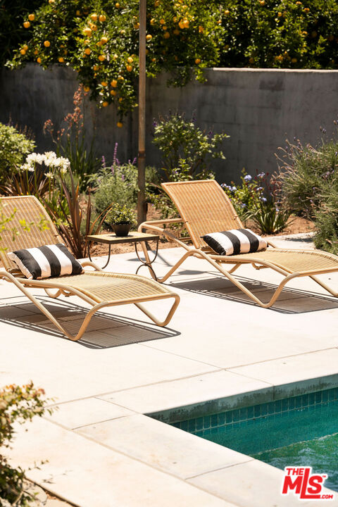 230 Marathon Road Altadena, CA 91001 - Photo 36 of 46 a view of swimming pool with a yard and sitting area