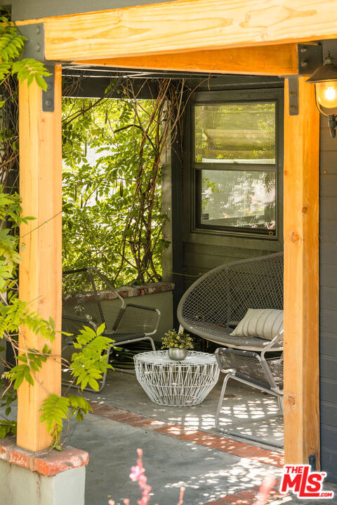 230 Marathon Road Altadena, CA 91001 - Photo 41 of 46 a vase of flowers sitting on a table