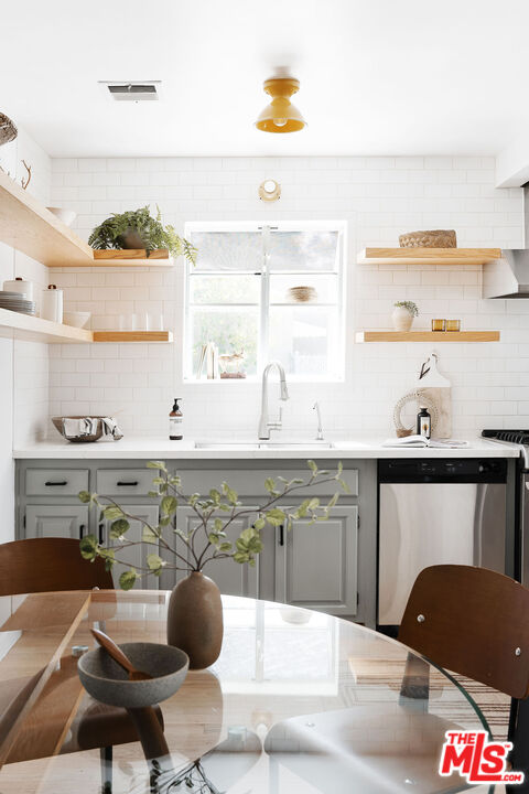230 Marathon Road Altadena, CA 91001 - Photo 10 of 46 a kitchen with a sink and cabinets