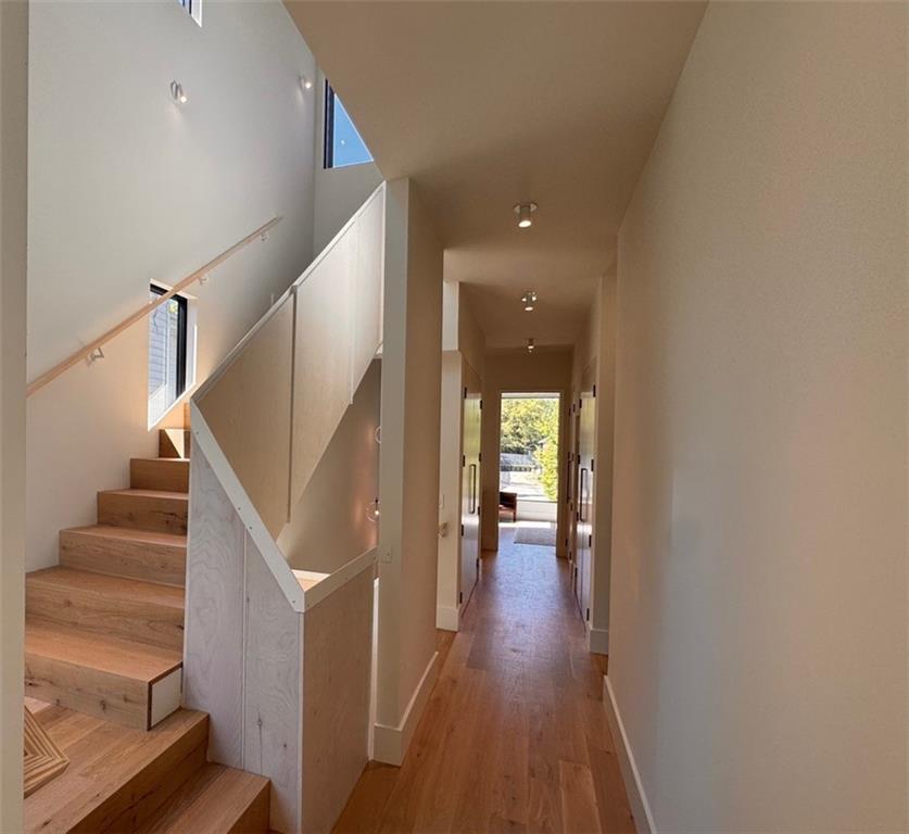 787 Bonaventure Avenue Northeast Atlanta, GA 30306 - Photo 28 of 64 a view of a hallway with wooden floor and staircase