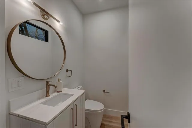 wooden floor in a hall with a window