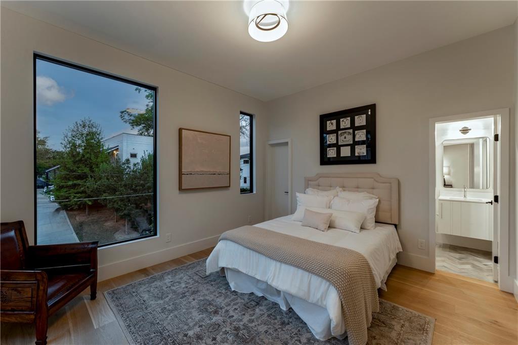 787 Bonaventure Avenue Northeast Atlanta, GA 30306 - Photo 38 of 64 a bedroom with a bed and a window