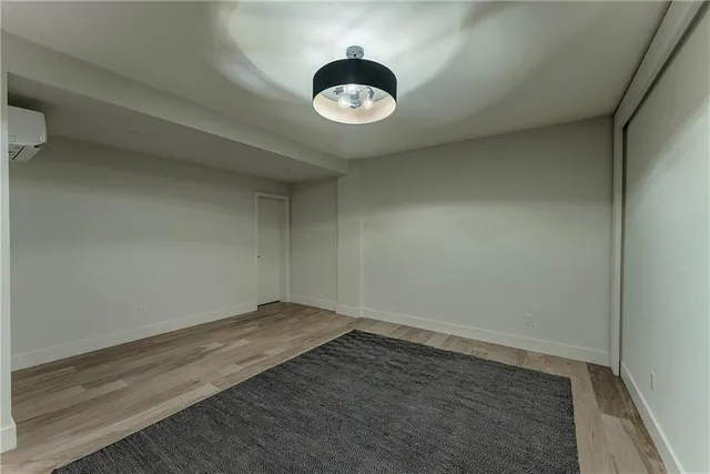 a view of a brick house with a yard