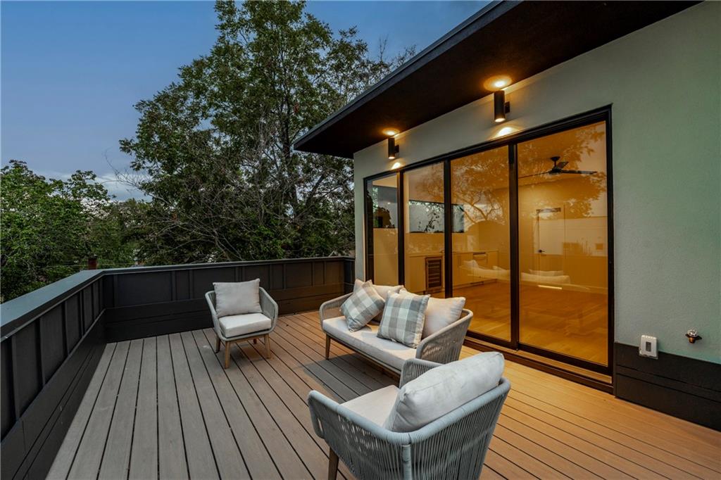 787 Bonaventure Avenue Northeast Atlanta, GA 30306 - Photo 47 of 64 a balcony with wooden floor and outdoor seating