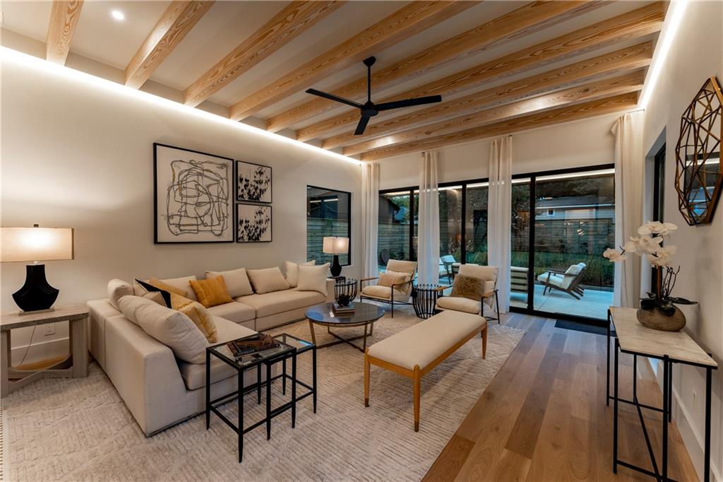 787 Bonaventure Avenue Northeast Atlanta, GA 30306 - Photo 6 of 64 a living room with furniture a flat screen tv and a large window