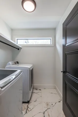 a bathroom with a sink toilet and mirror