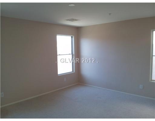 629 Monument Point Street Henderson, NV 89002 - Photo 7 of 13 Master Bedroom.