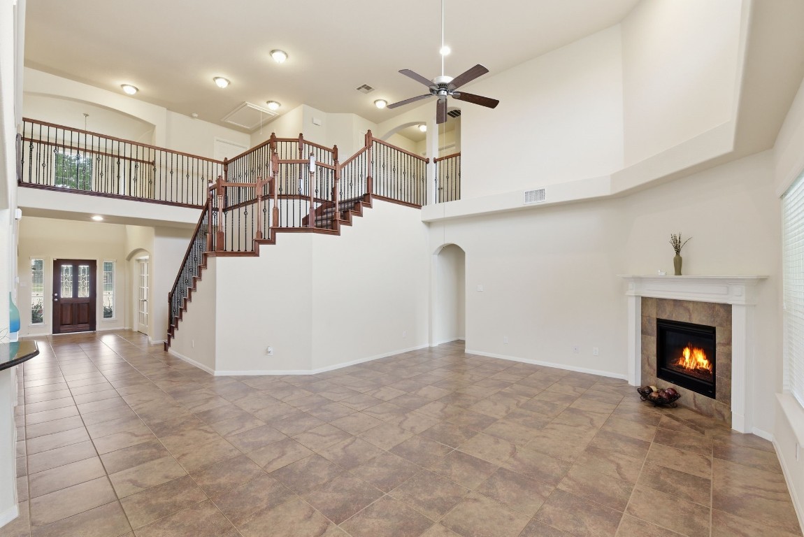 3301 Remington Rise Lane Katy, TX 77494 - Photo 16 of 50 a view of a living room and a fireplace