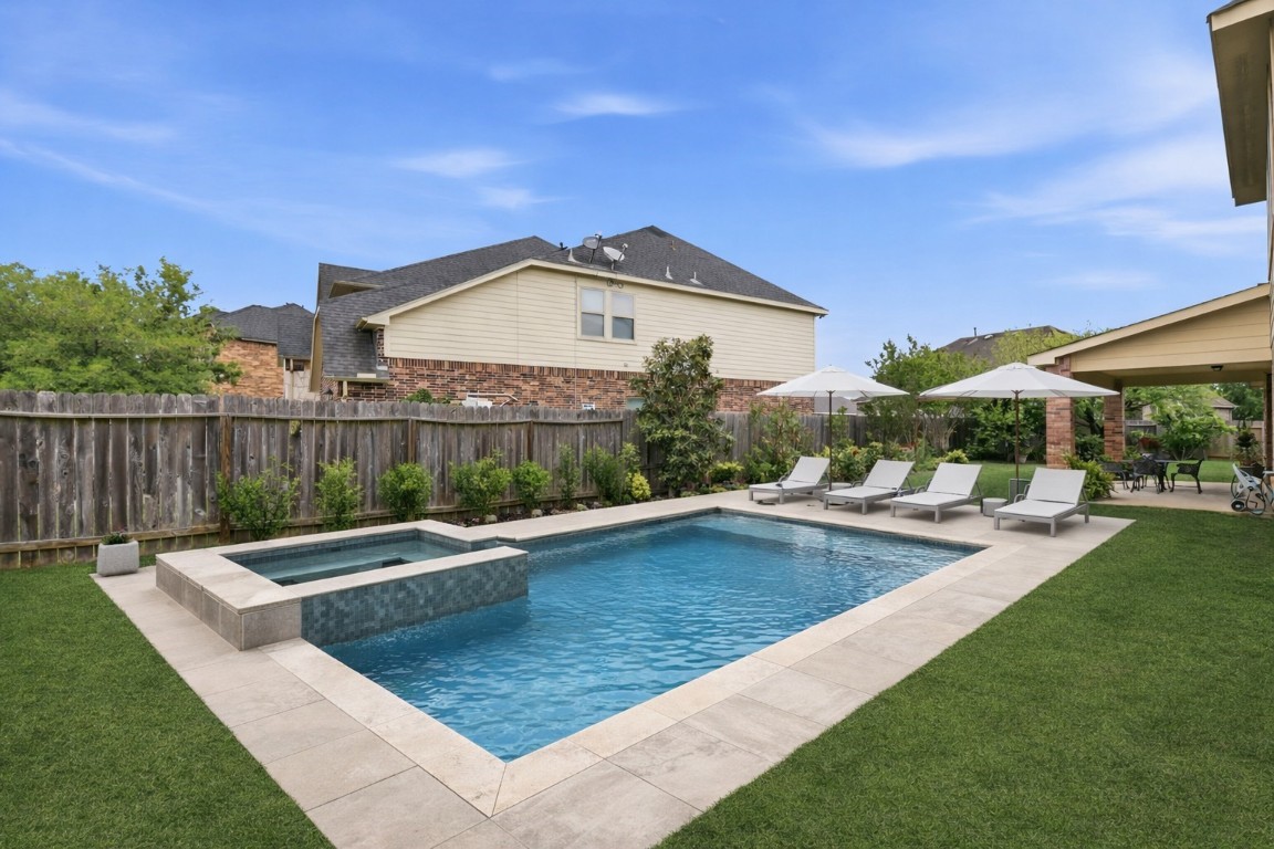 3301 Remington Rise Lane Katy, TX 77494 - Photo 2 of 50 a view of a house with backyard and sitting area