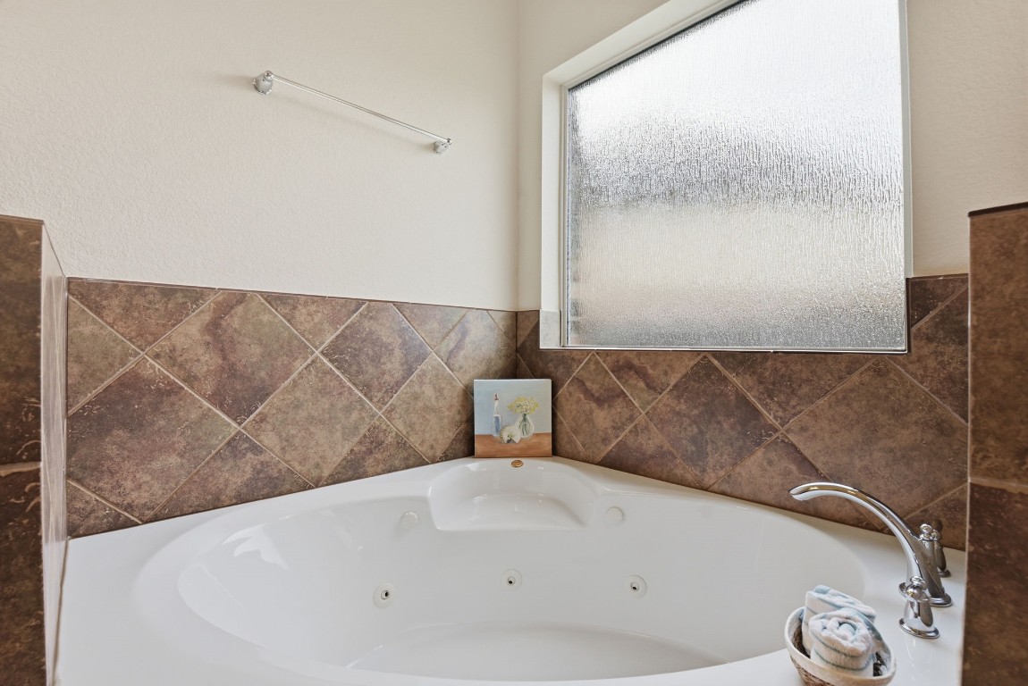 3301 Remington Rise Lane Katy, TX 77494 - Photo 27 of 50 a bathroom with a bathtub