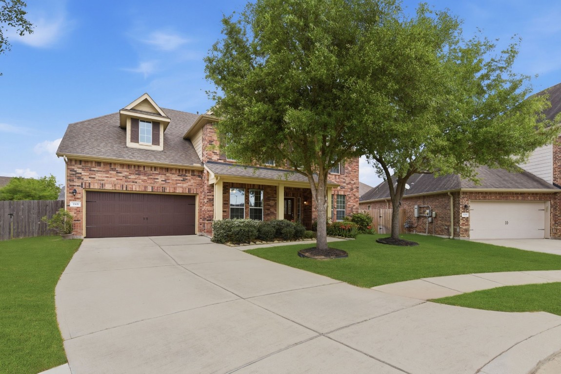 3301 Remington Rise Lane Katy, TX 77494 - Photo 3 of 50 a front view of house with yard and green space