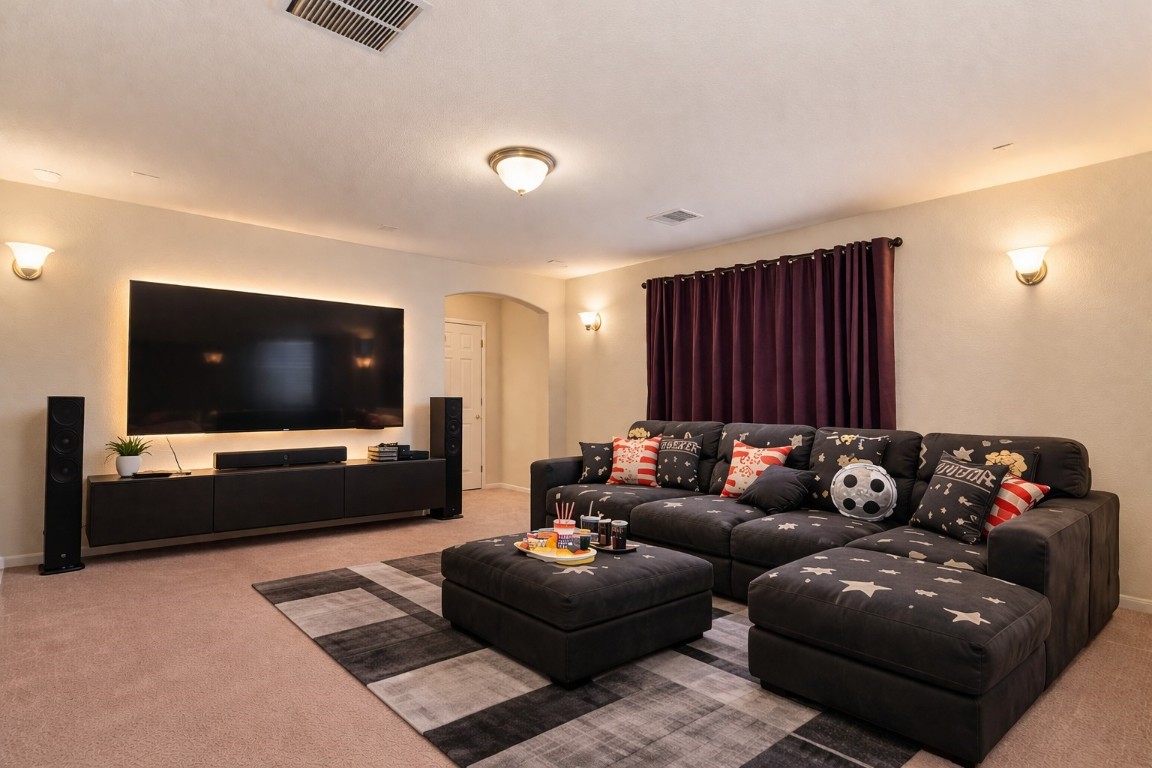 3301 Remington Rise Lane Katy, TX 77494 - Photo 31 of 50 a living room with furniture and a flat screen tv