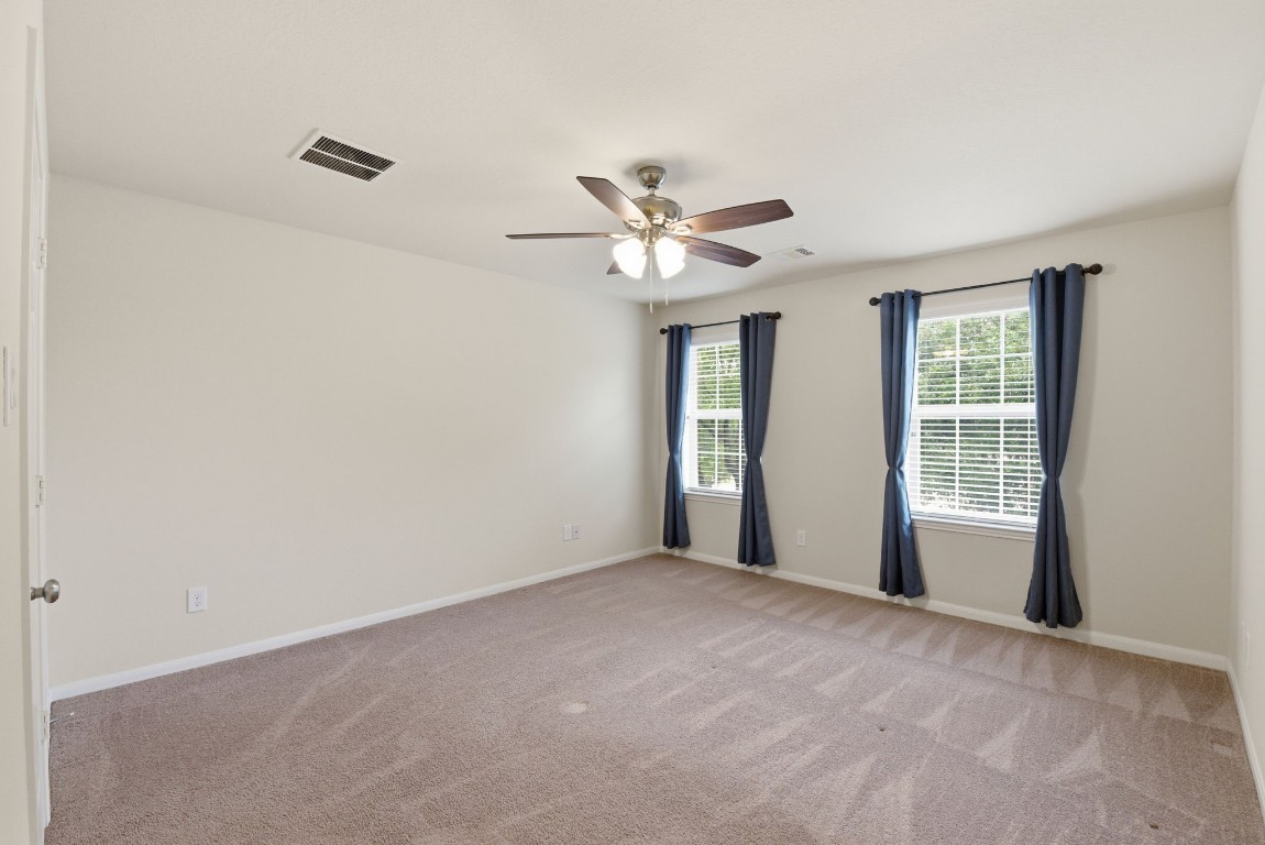 3301 Remington Rise Lane Katy, TX 77494 - Photo 33 of 50 a view of an empty room with a window