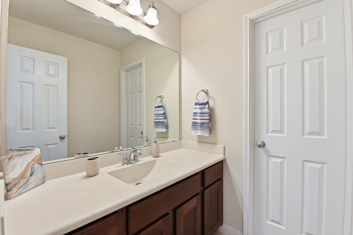 3301 Remington Rise Lane Katy, TX 77494 - Photo 36 of 50 a bathroom with double vanity sink and a mirror