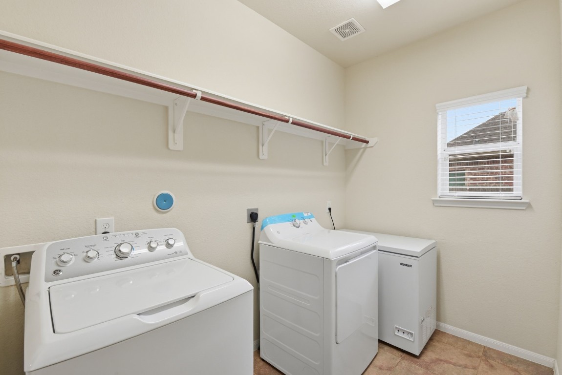 3301 Remington Rise Lane Katy, TX 77494 - Photo 40 of 50 a utility room with dryer and washer
