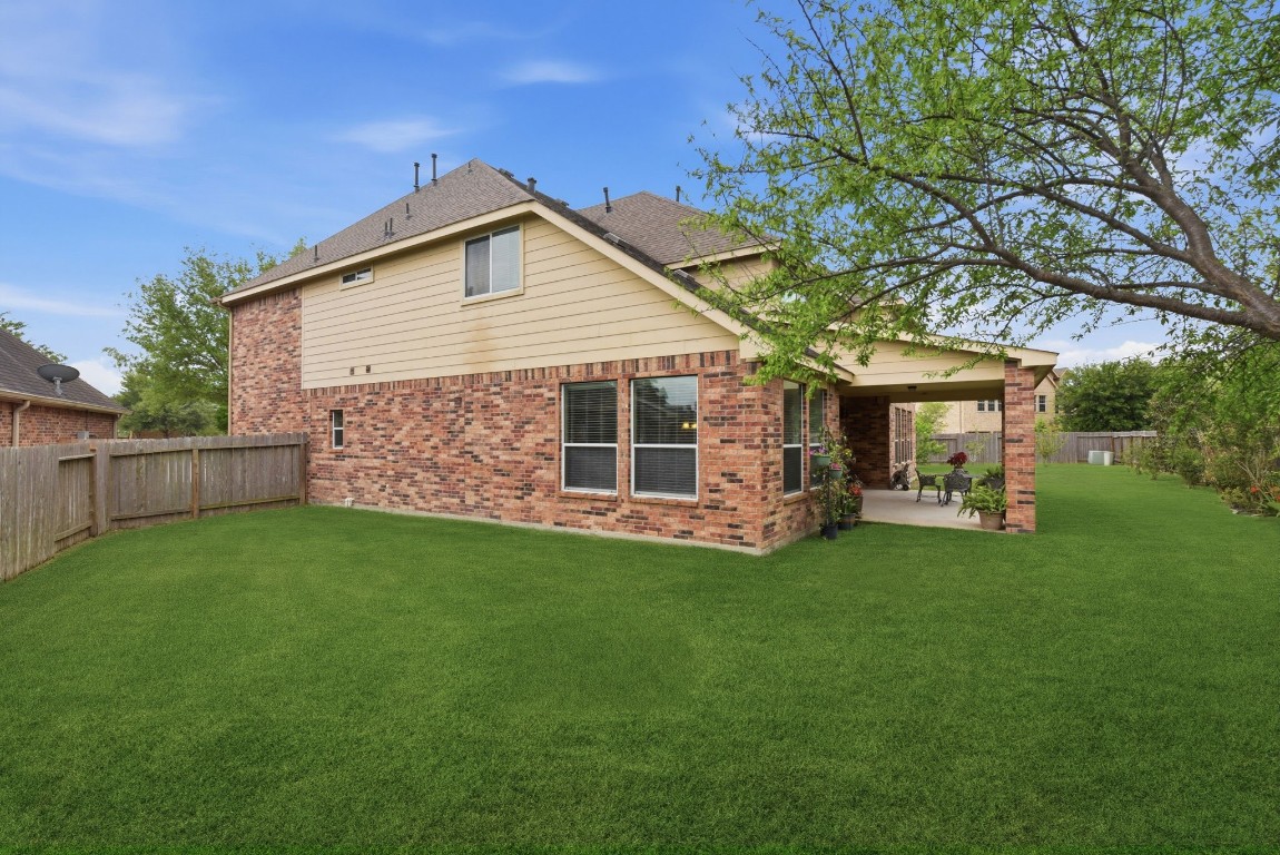 3301 Remington Rise Lane Katy, TX 77494 - Photo 44 of 50 a view of a house with backyard porch and garden