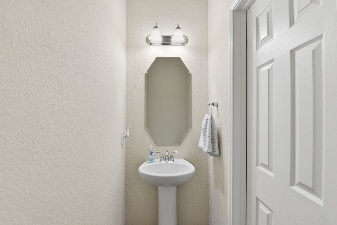 3301 Remington Rise Lane Katy, TX 77494 - Photo 9 of 50 a bathroom with a sink and a mirror
