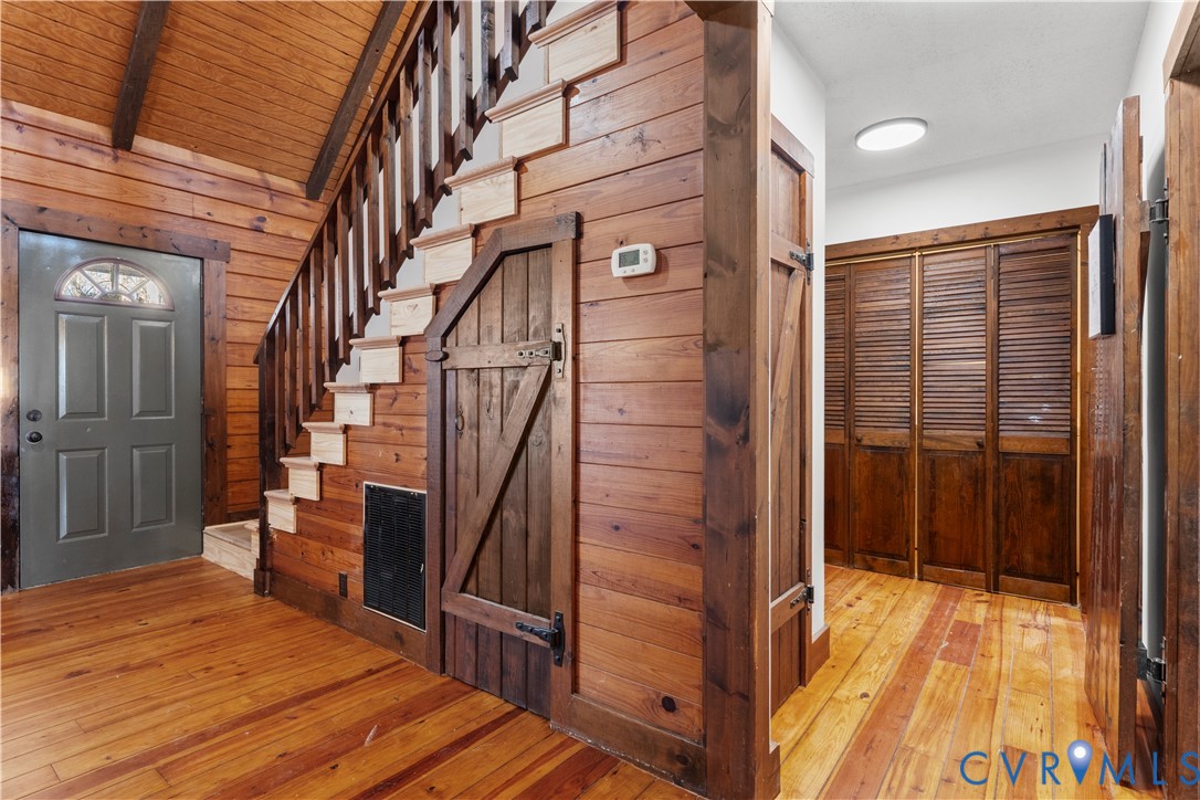 45 Morningside Road Cartersville, VA 23027 - Photo 21 of 50 a view of a hallway with wooden floor and staircase