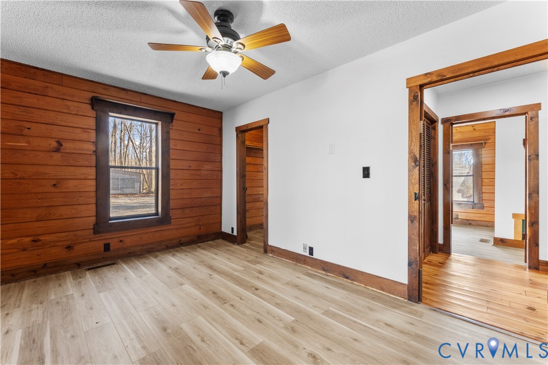 45 Morningside Road Cartersville, VA 23027 - Photo 24 of 50 a view of an empty room with window and wooden floor