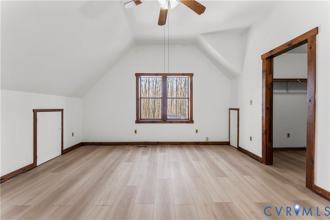 45 Morningside Road Cartersville, VA 23027 - Photo 35 of 50 an empty room with wooden floor cabinet and windows
