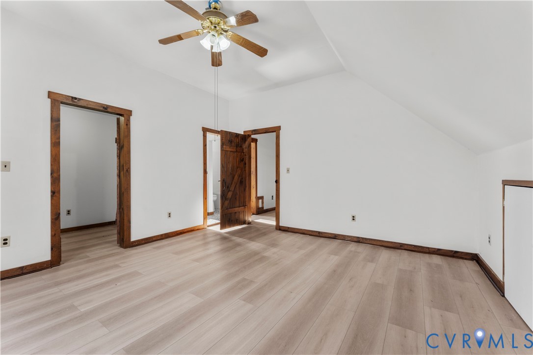 45 Morningside Road Cartersville, VA 23027 - Photo 36 of 50 a view of an empty room with window and wooden floor